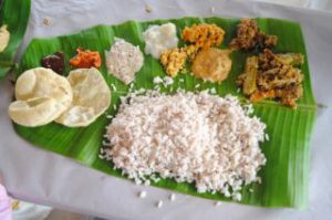 Traditional Onam Sadya served on banana leaf during Onam Festival in Kerala
