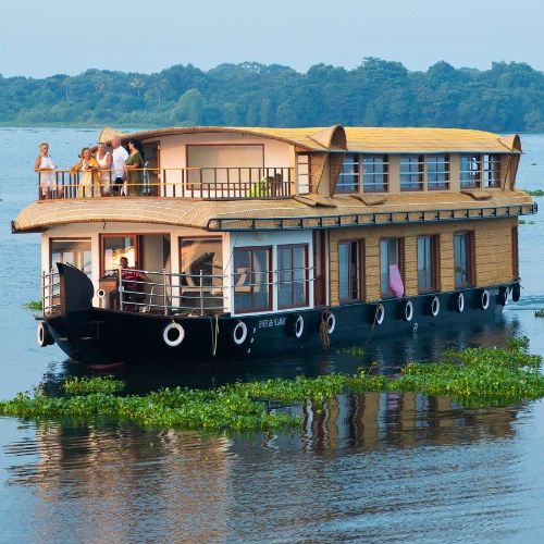 Houseboat travel in Kerala in February on calm backwaters
