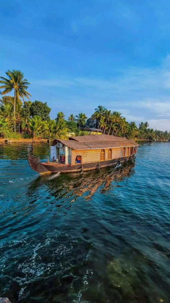 Alleppey houseboat in summer cruising through Kerala backwaters