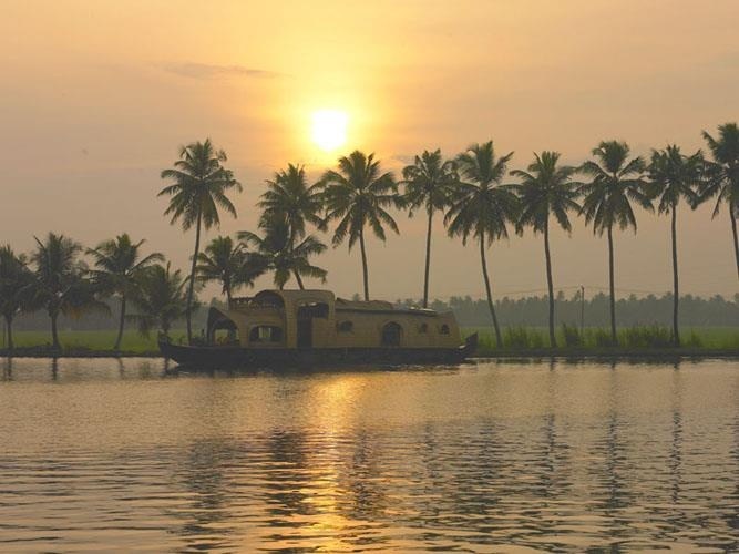 Scenic Kerala backwaters during an Alleppey houseboat summer trip